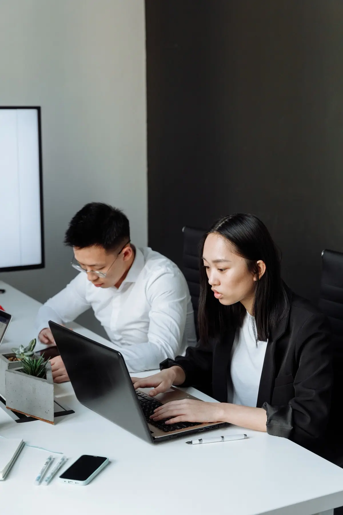 Analyst reviewing trade records
